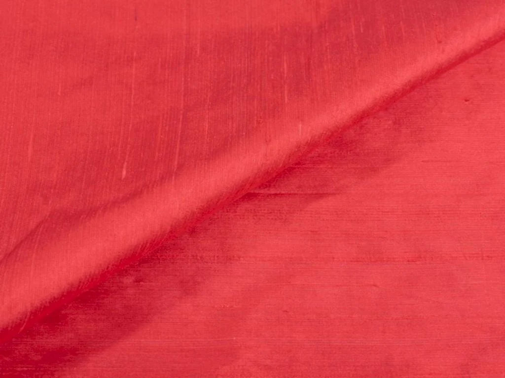 Carrot Orange Plain Dyed Bangalore Raw Silk Fabric