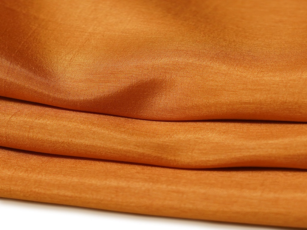 Golden Orange Plain Viscose Dola Silk Fabric
